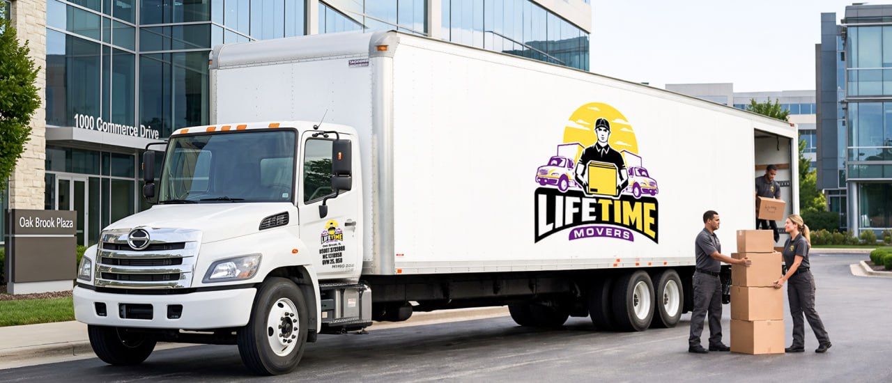 LifeTime Movers truck with crew loading boxes outside Oak Brook Plaza